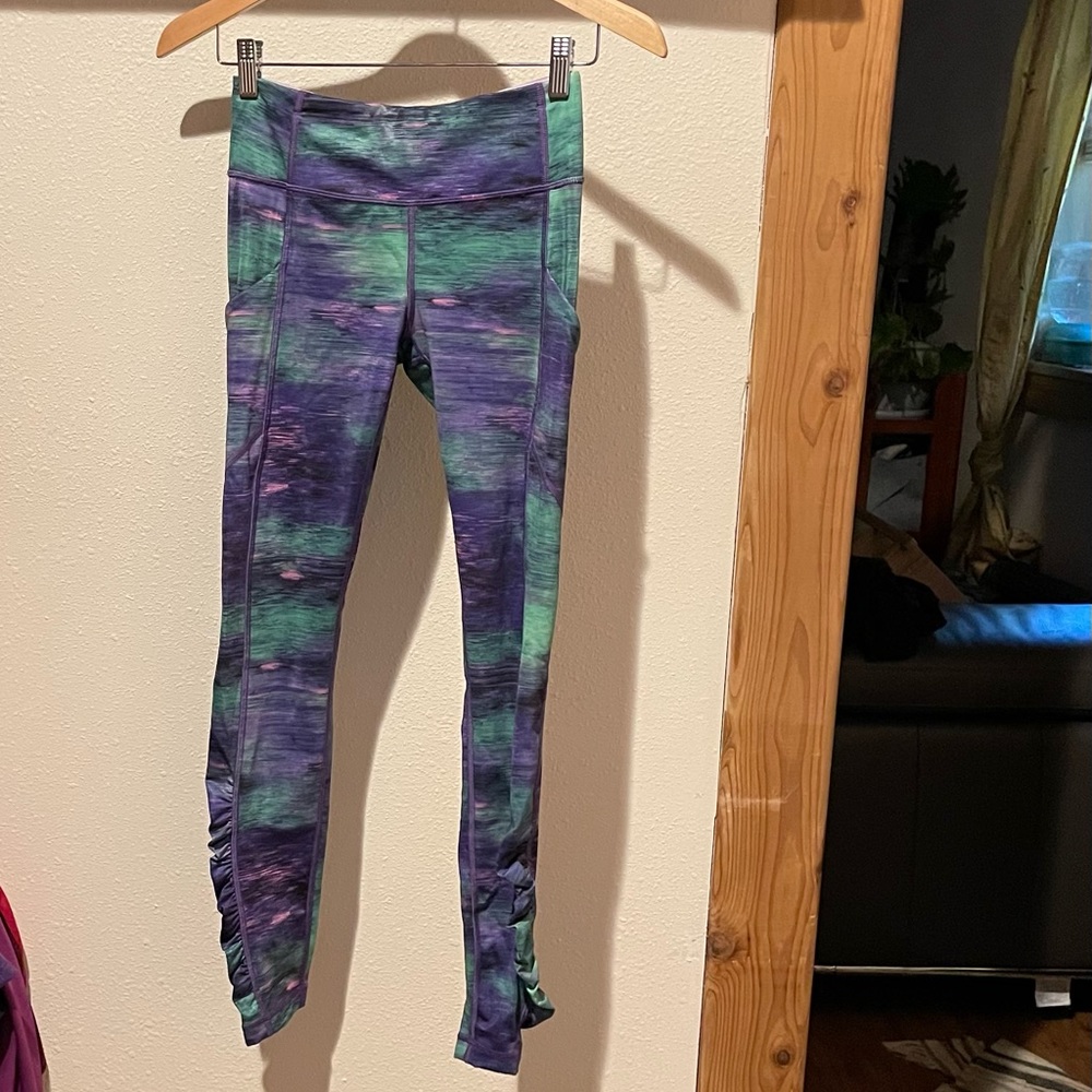 Lululemon leggings size 4, purple and green multi colored. Worn a few times.
